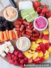 Low-Calorie Charcuterie Board Recipes That Impress 7 Low Calorie Charcuterie Board with Berries, Veggies, Hummus, Cheeses and Meats