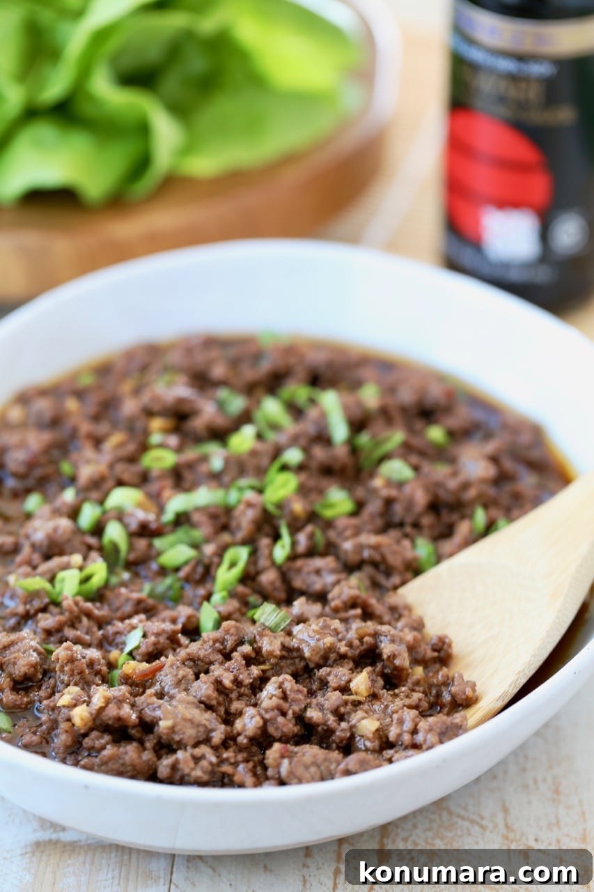 Korean BBQ Beef (Bulgogi) Recipe: Sweet and Savory Marinade 2 Korean BBQ Beef in a Bowl with Diced Scallions