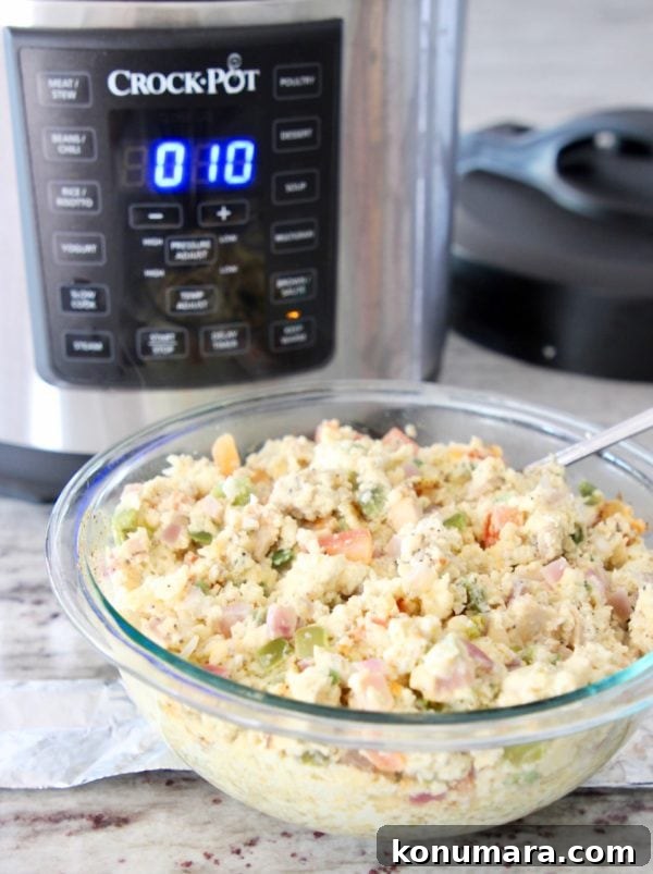 Pressure Cooker Breakfast Tacos Recipe 6 Scrambled eggs for breakfast tacos in bowl with Crock Pot pressure cooker