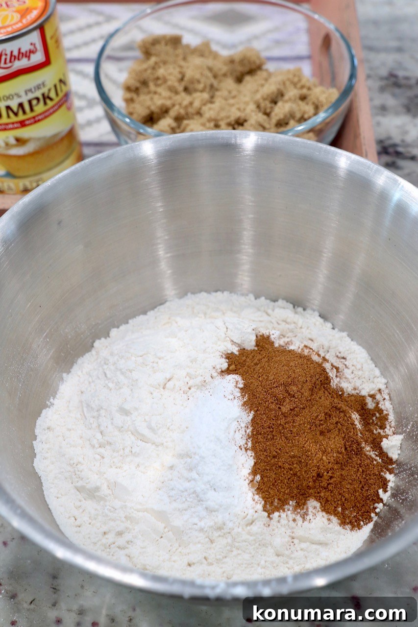 Moist Pumpkin Cupcakes with Tangy Cream Cheese Frosting 4 flour, baking soda and spices in mixing bowl