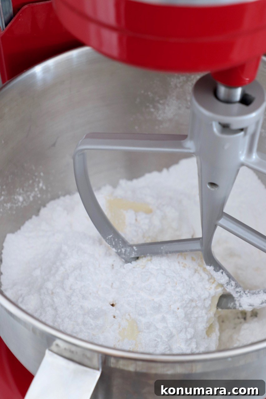 Moist Pumpkin Cupcakes with Tangy Cream Cheese Frosting 9 cream cheese frosting ingredients in stand mixer
