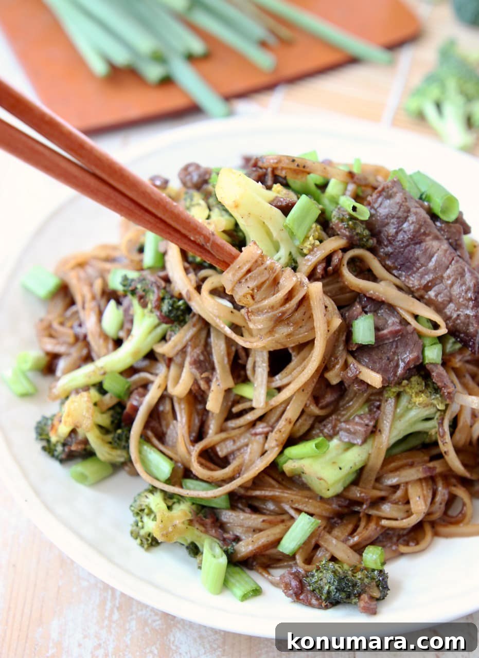 Slow Cooker Black Pepper Beef with Broccoli Recipe 3 Black Pepper Beef and Broccoli with Noodles, swirled by chopsticks