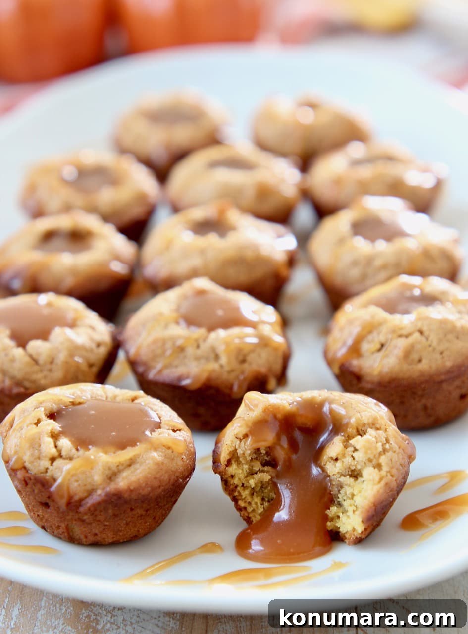 Salted Caramel Pumpkin Cookie Cups 2 Pumpkin cookies filled with salted caramel sauce on plate