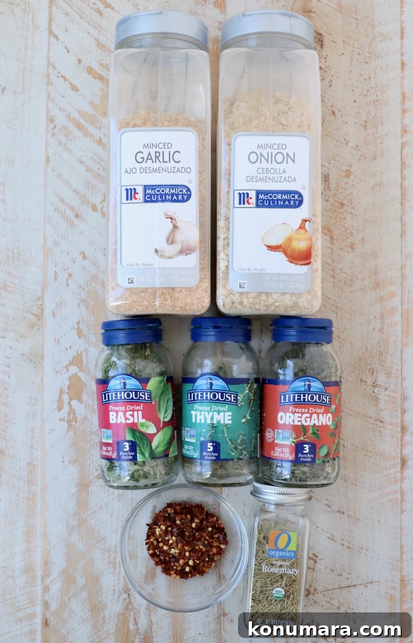 Homemade Italian Seasoning Mix for Pasta and Pizza 3 containers of herbs and spices lined up on white wood board