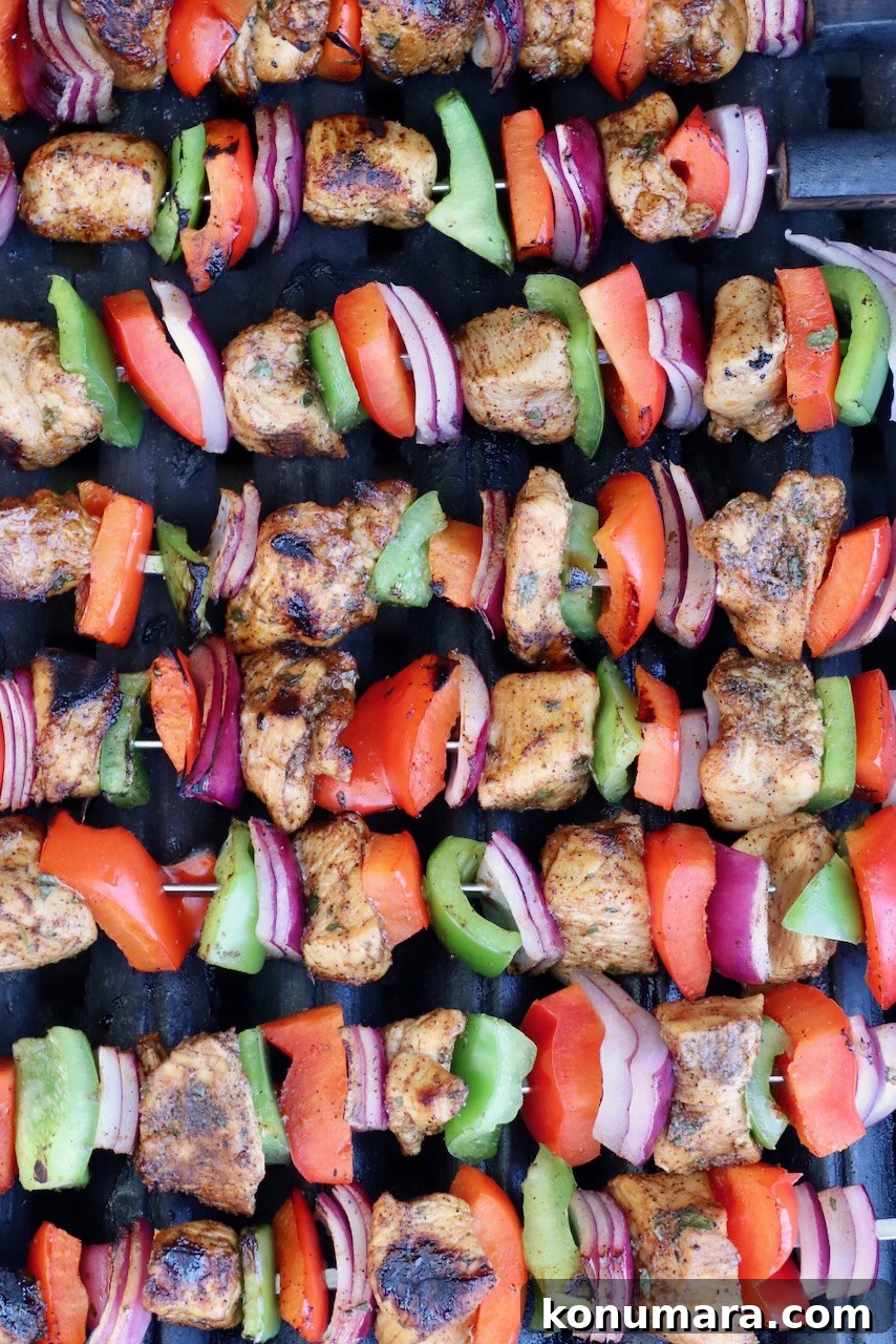 fajita chicken skewers on a grill