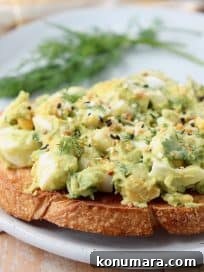 Egg salad on toast topped with everything bagel seasoning and fresh dill