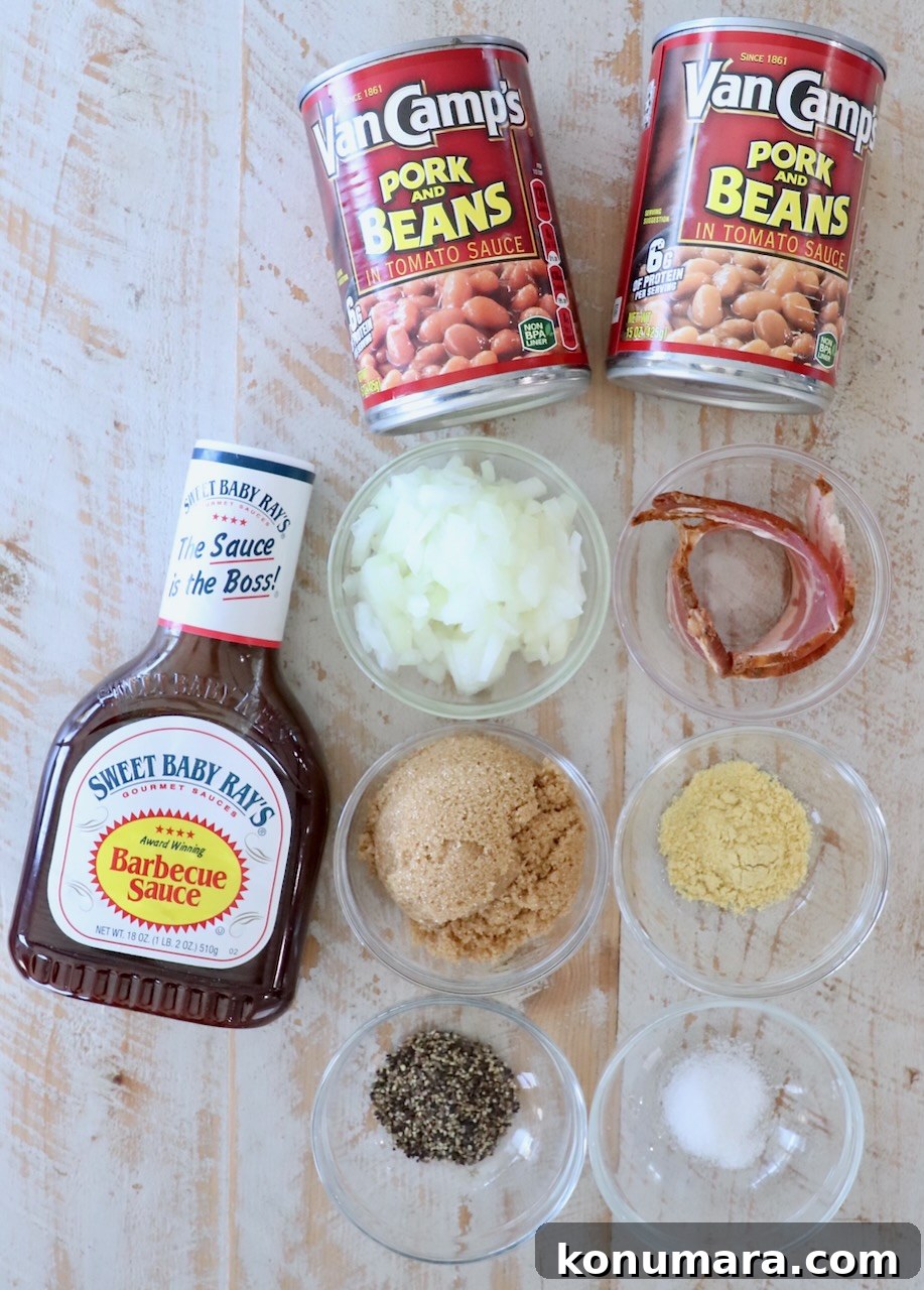 Dad's Signature Smoky BBQ Baked Beans Recipe 3 ingredients for bbq baked beans on a white wood board