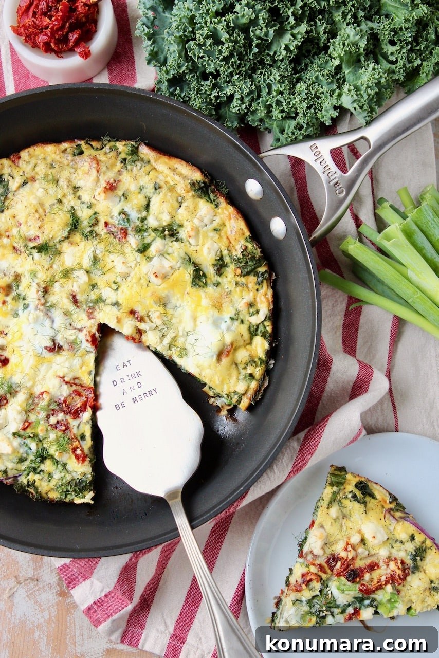 Frittata in skillet, with slice cut out on plate to the side