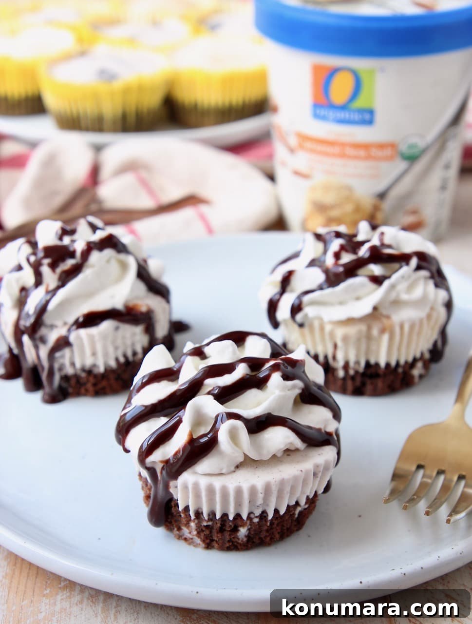 Mini Ice Cream Cake Recipes for Summer Parties 6 Mini ice cream cakes on plate with gold and white fork