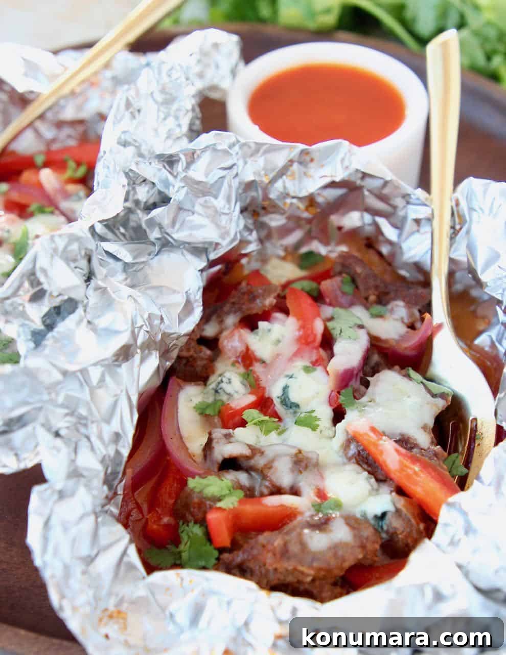 Buffalo cheesesteak meat and peppers in foil pack