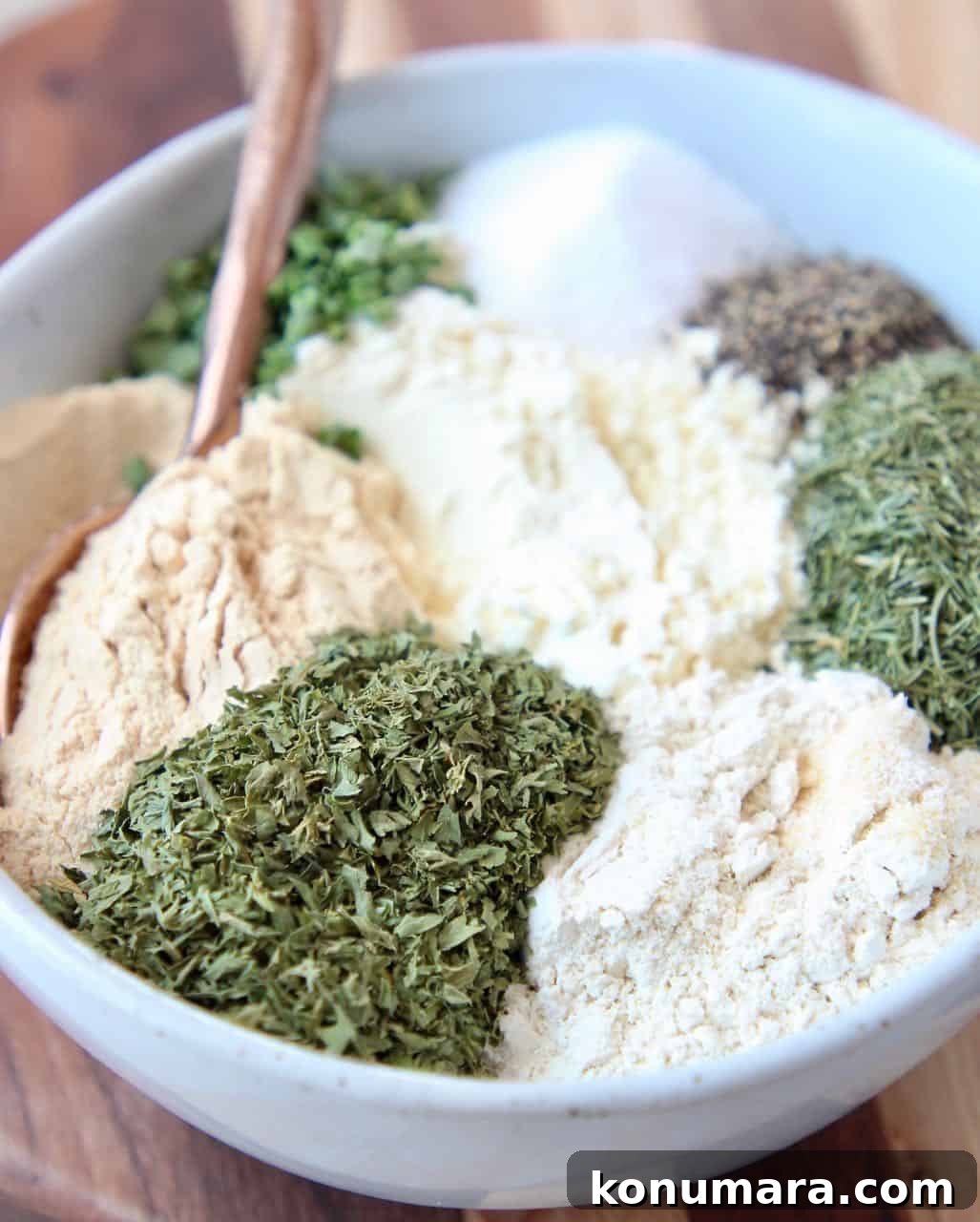 Homemade ranch seasoning mix ingredients separated in a bowl