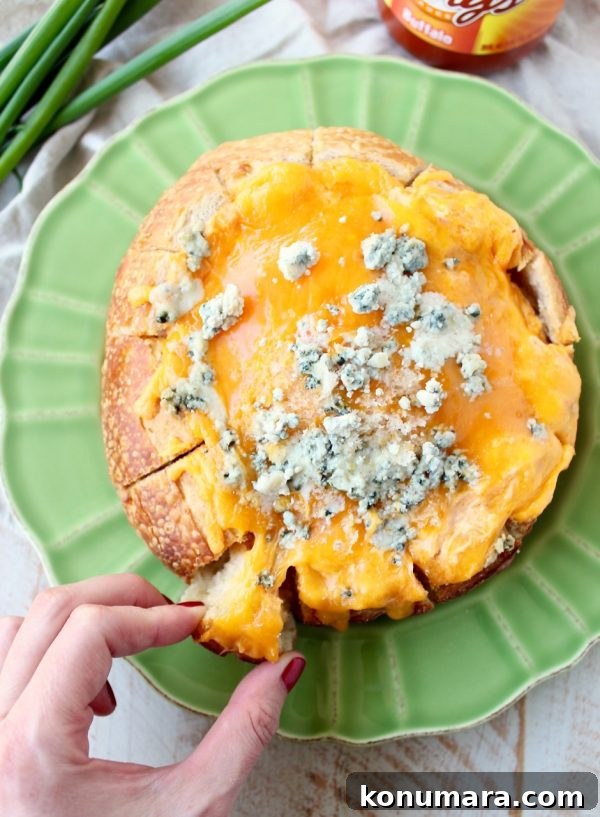 Slow Cooker Buffalo Chicken Recipe 8 Everyone's favorite buffalo chicken dip is baked right into a bread bowl for the perfect party, game day or weekend appetizer!