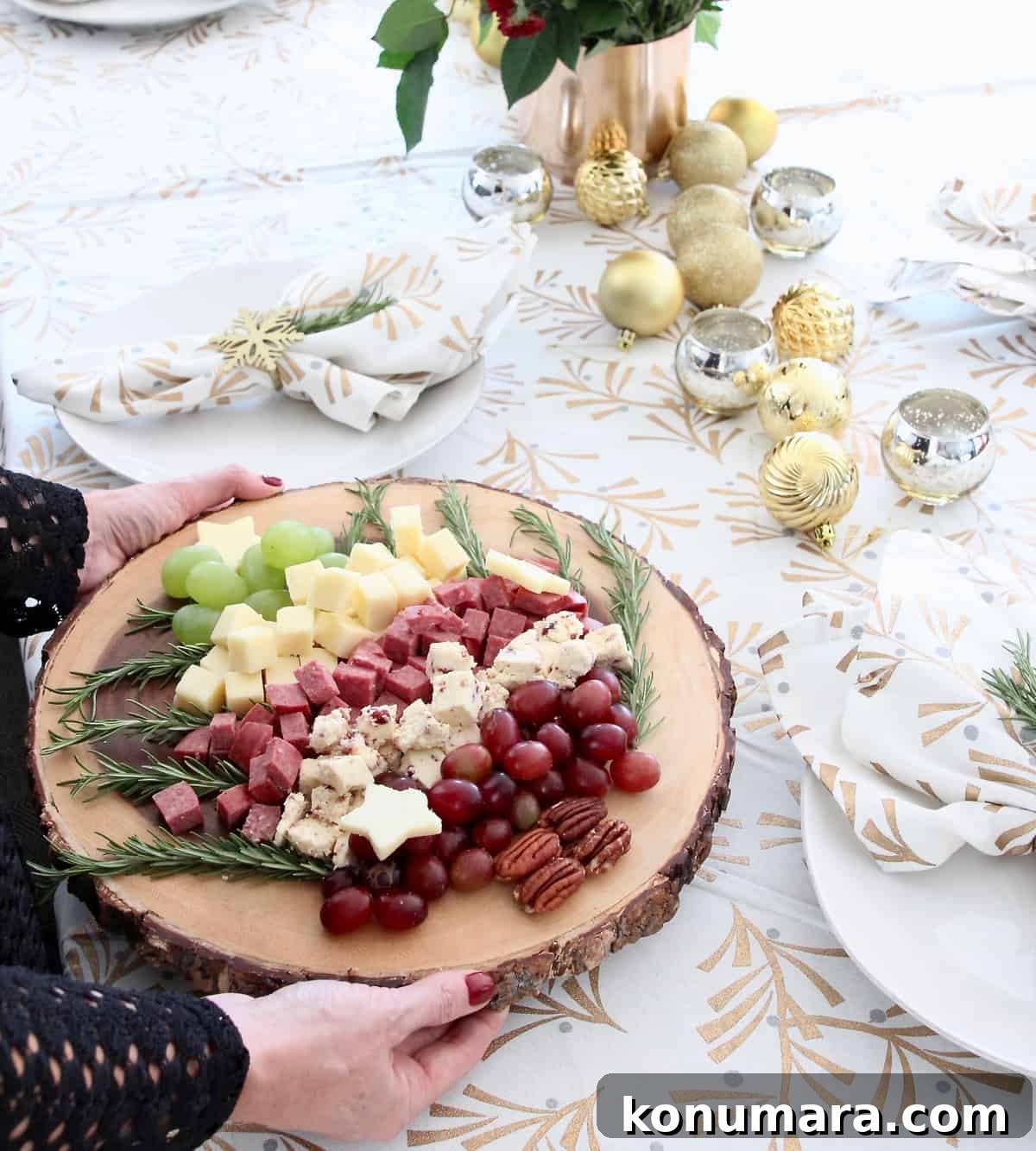 Christmas Tree Cheese Board Ideas for Holiday Parties 3 Hands holding Christmas tree holiday cheese board