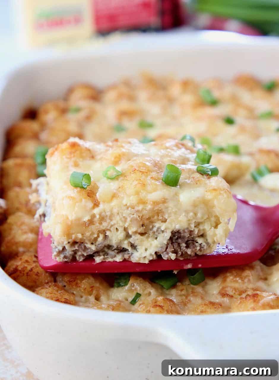 Slice of breakfast casserole on spatula coming out of the casserole dish