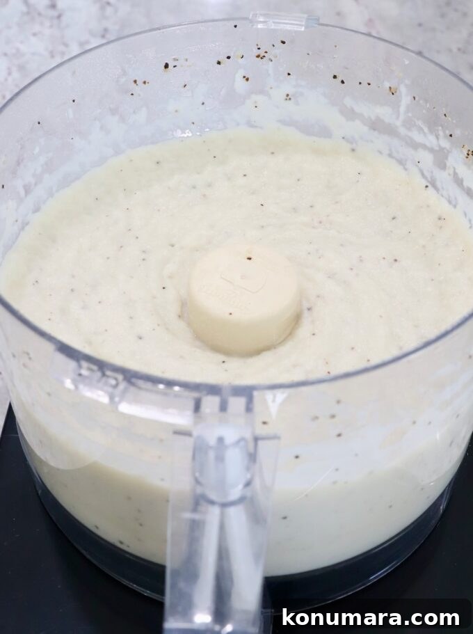pureed cauliflower in a food processor