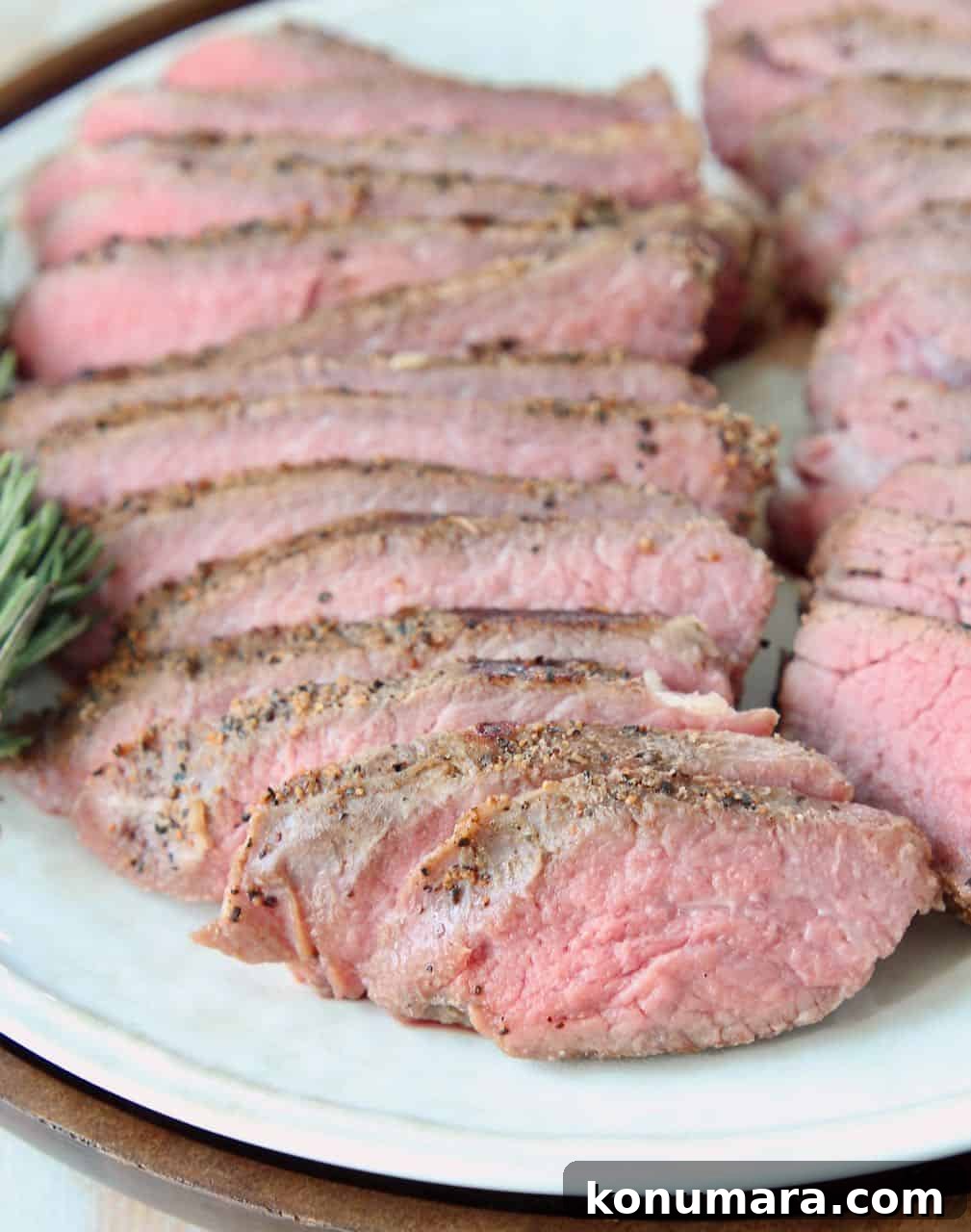 Sliced sous vide tri tip steak on plate