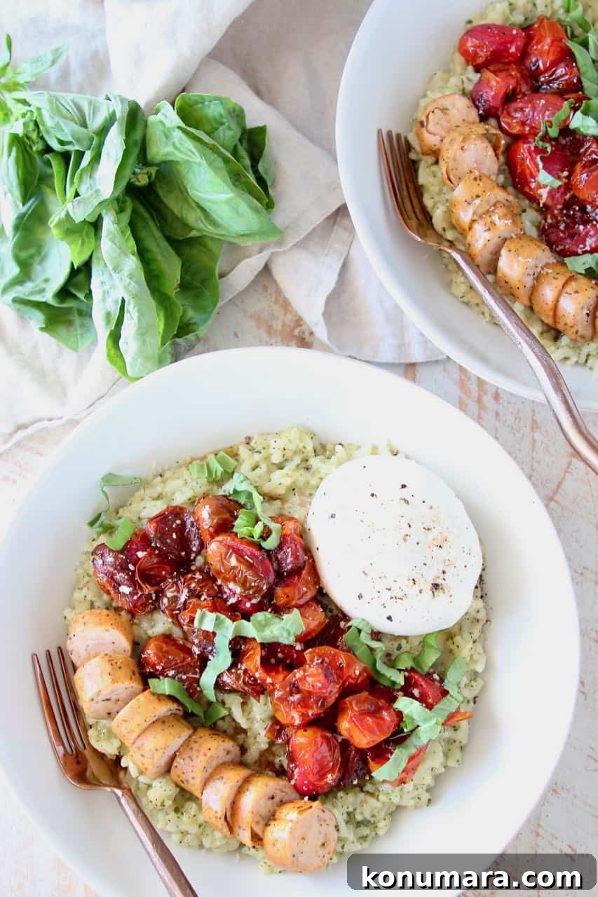 Creamy Instant Pot Pesto Risotto 4 Pesto risotto in bowl, topped with sausage, tomatoes and cheese