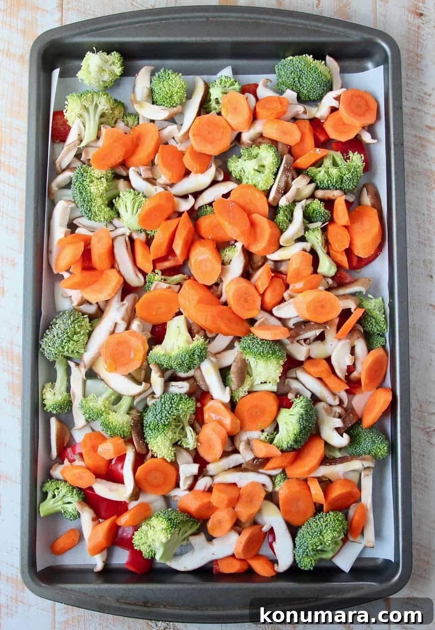 Soy Ginger Glazed Roasted Asian Vegetables Recipe 4 Overhead image of chopped veggies on baking sheet
