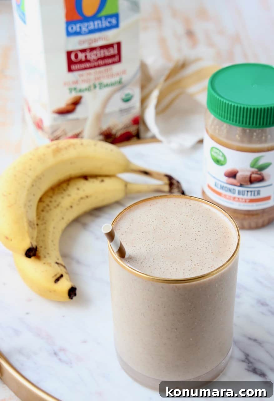Almond Milk Smoothie Recipe with Banana and Protein 4 smoothie in glass with straw