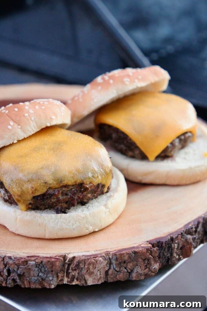 10 Essential Grilling Tips and Tricks for Perfect BBQ 5 grilled cheeseburgers on wood cutting board
