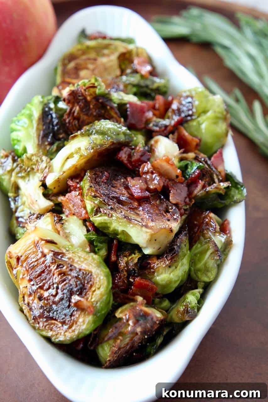 Maple Bacon Brussels Sprouts finished in a serving dish with crispy bacon