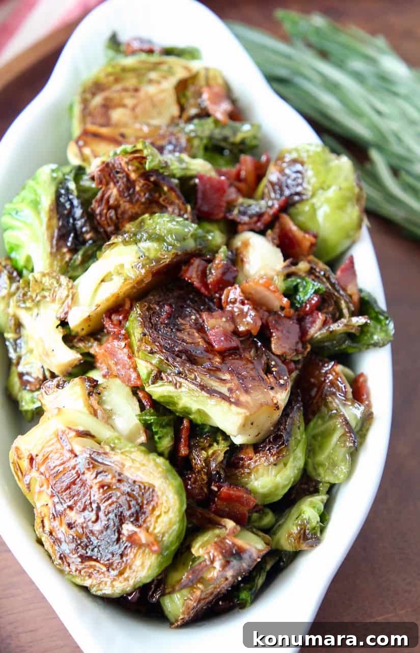 Pan-fried maple bacon brussels sprouts served in a white dish