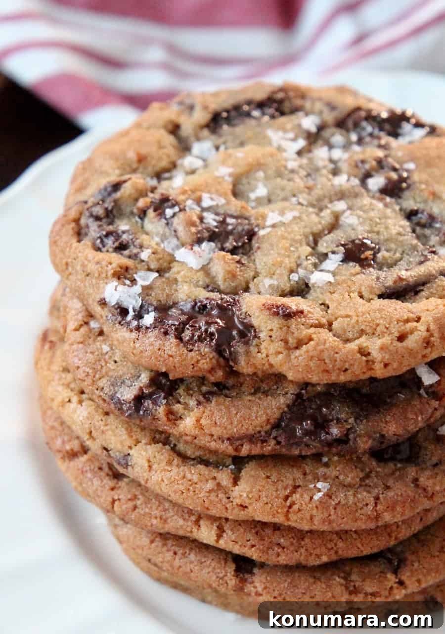 Sea Salt Chocolate Chunk Cookies Recipe 6 stacked up chocolate chip cookies on plate