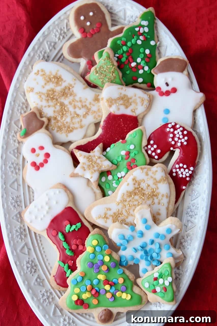 Overhead image of decorated sugar cookies on plate