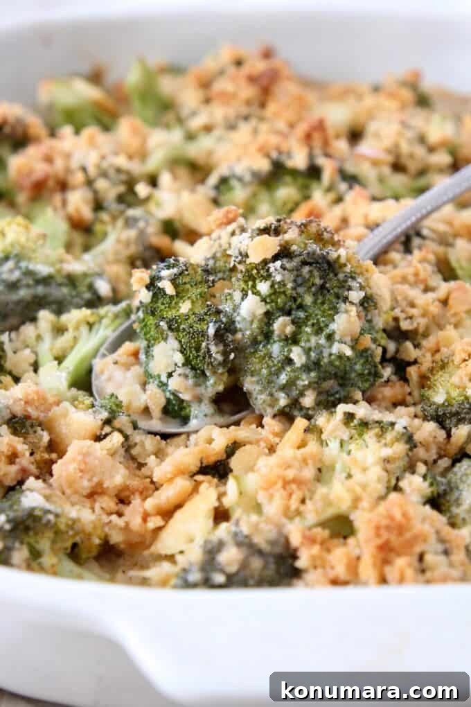 20 Must-Try Recipes from 2020 15 broccoli cheese casserole with serving spoon lifting broccoli out of the dish
