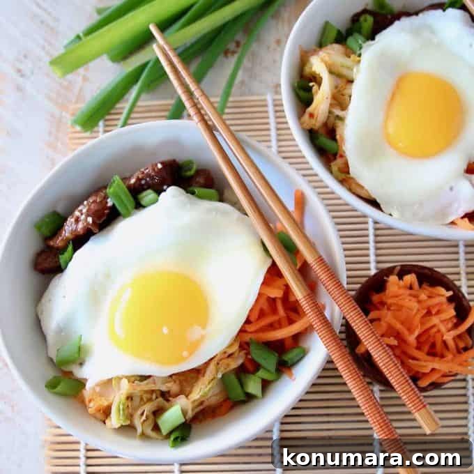20 Must-Try Recipes from 2020 3 Cauliflower rice bowls topped with fried eggs and shredded carrots