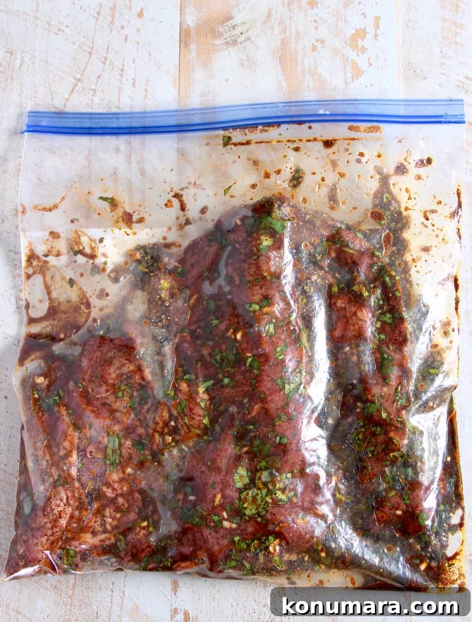marinating carne asada in ziplock bag