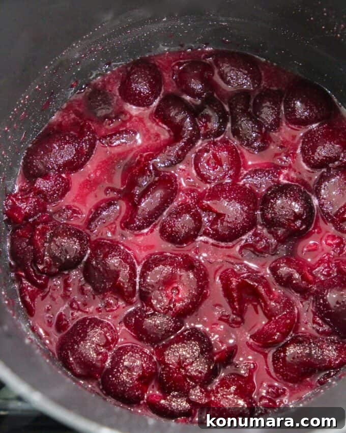 No-Churn Cherry Garcia Ice Cream Recipe 6 cooked cherries in saucepan