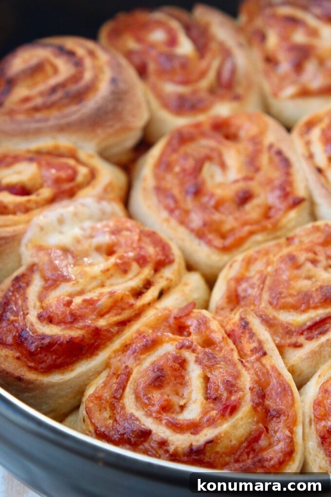 Crispy Homemade Pizza Rolls with Gooey Cheese 6 pizza rolls in baking dish