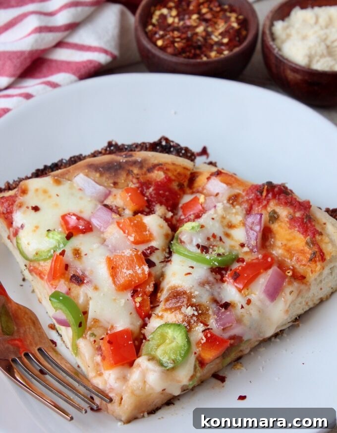 Kurt's Signature Crispy Pan Pizza Recipe 3 two slices of pizza on a white plate