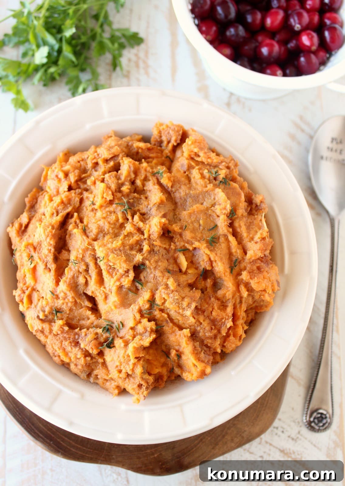 Creamy Mashed Sweet Potatoes Recipe with Brown Butter 2 mashed sweet potatoes in white bowl