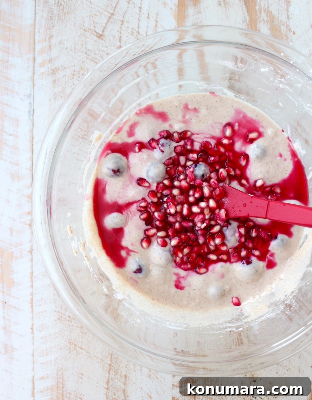 Fresh cranberries & pomegranates add a delicious burst of tartness & sweetness to this easy waffles recipe, perfect for fall breakfast or holiday brunch!