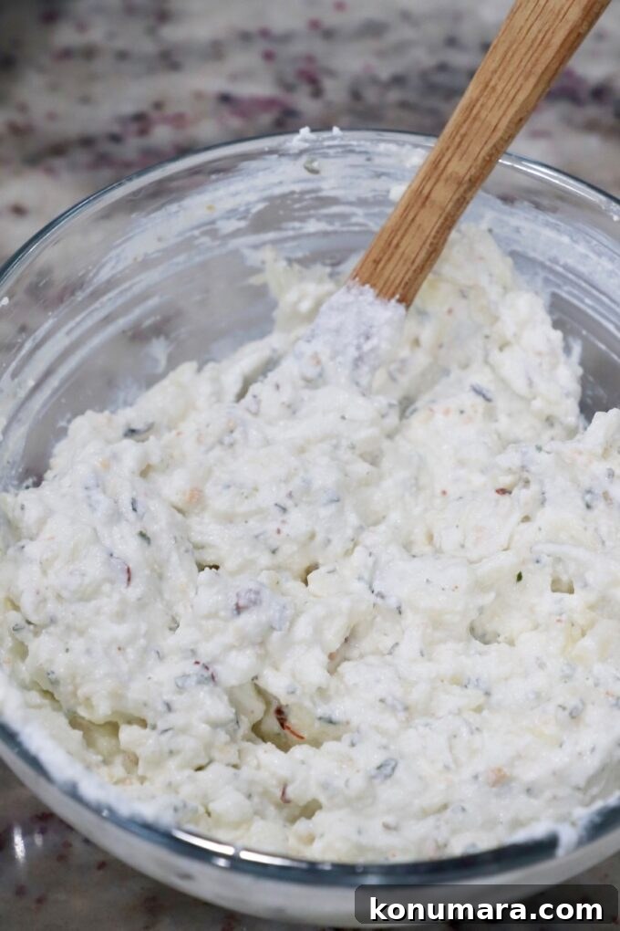ricotta mozzarella cheese mixture in glass bowl
