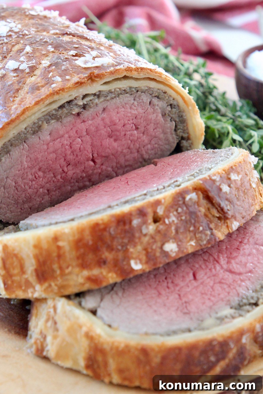 How to Make Classic Beef Wellington with Mushroom Duxelles 10 sliced cooked beef wellington