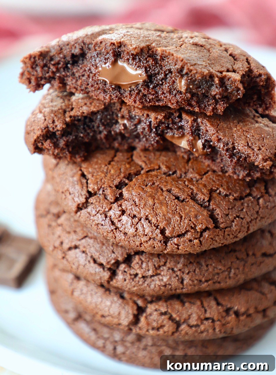 stack of chocolate cookies on plate