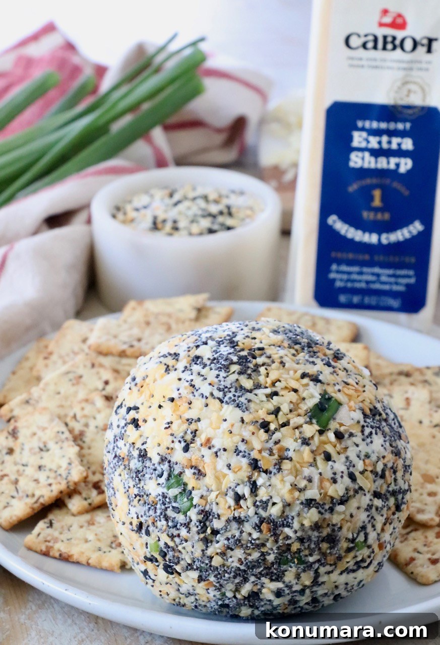 cheese ball on plate with crackers