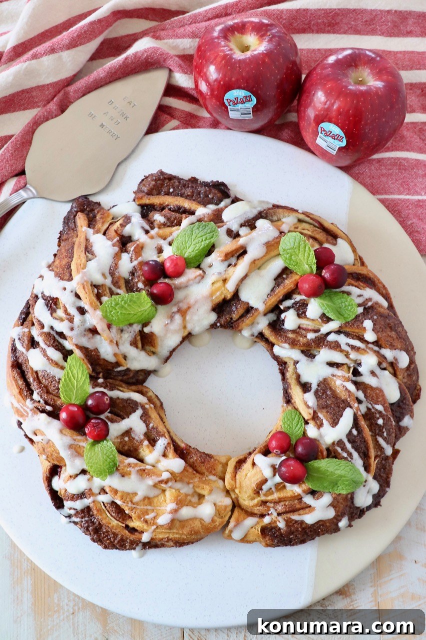 cinnamon roll wreath on round serving tray