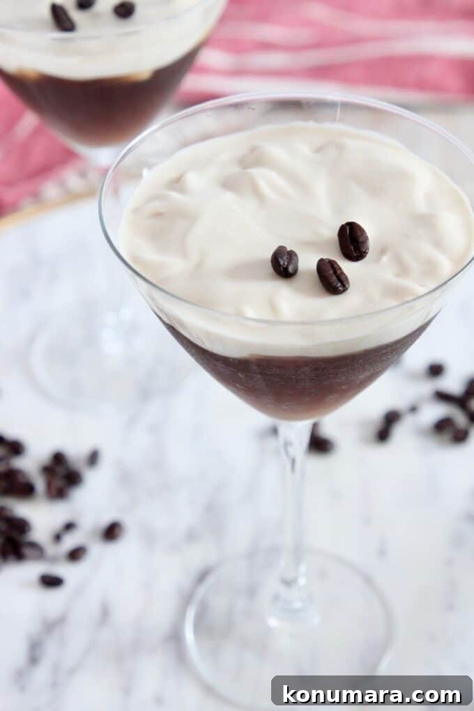 two espresso martinis on marble serving tray