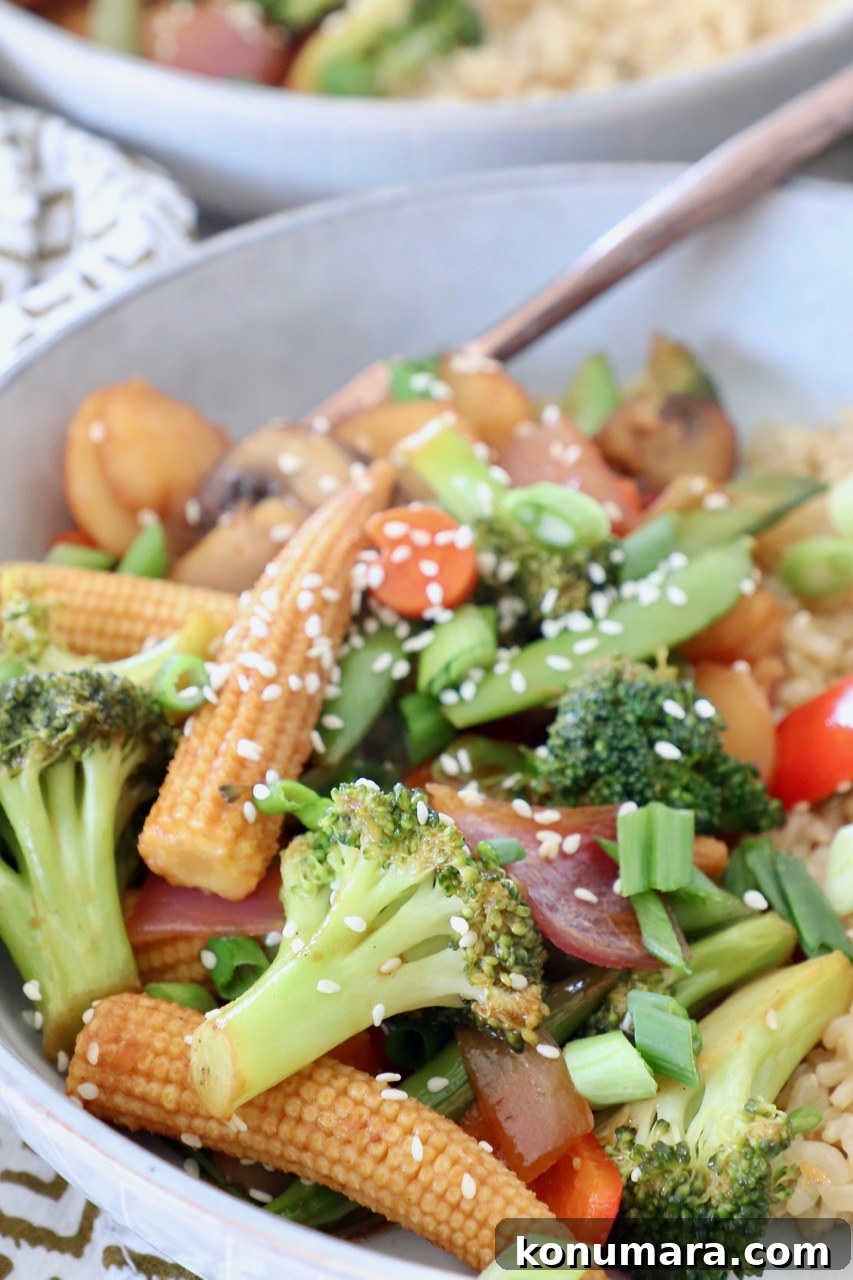 Crispy Garlic and Ginger Stir-Fried Vegetables Recipe 6 stir fry vegetables in bowl with fork