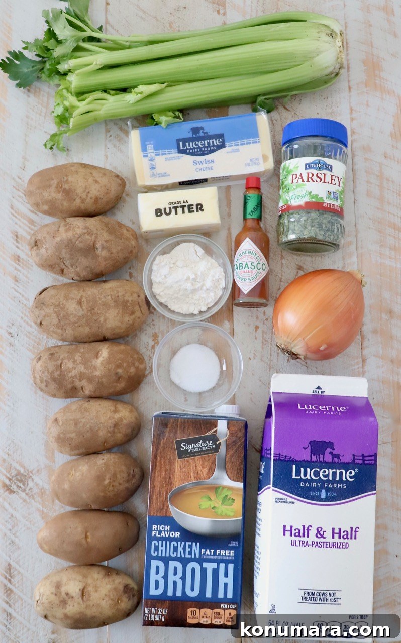 potato soup ingredients on white wood board