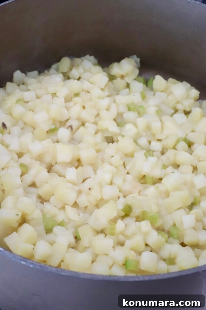 cooked diced potatoes in a large pot