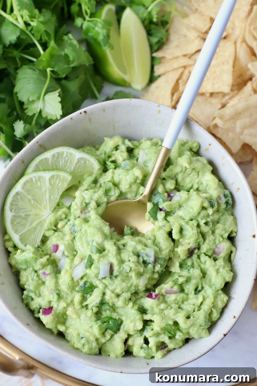 guacamole in bowl with spoon