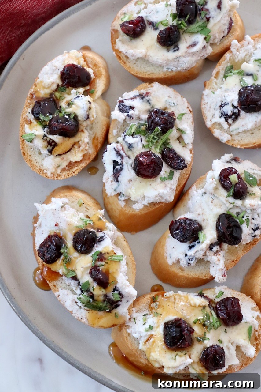 Cranberry goat cheese crostini on a plate