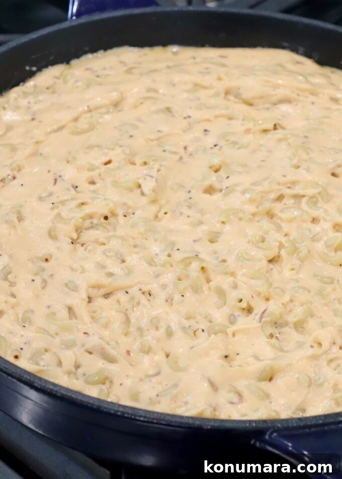 macaroni and cheese in skillet on stove