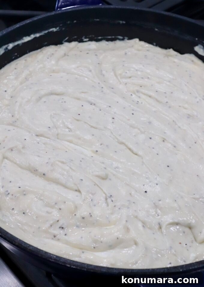creamy sauce in pan for mac and cheese