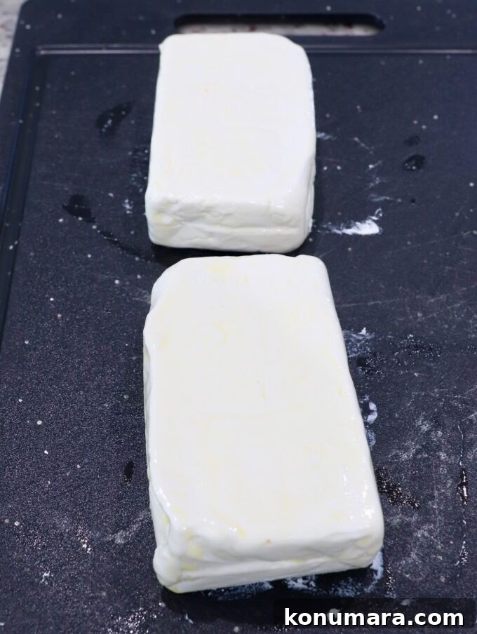 Smoked Cream Cheese Recipe and Serving Ideas 4 blocks of cream cheese on cutting board
